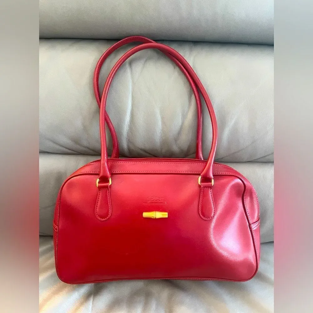 Vintage Longchamp Roseau Leather Bag in the color Bordeaux.